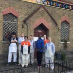 Axis apprentices standing in front of Tabernacle Christian Centre