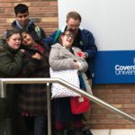 Four young vulnerable people outside Coventry University
